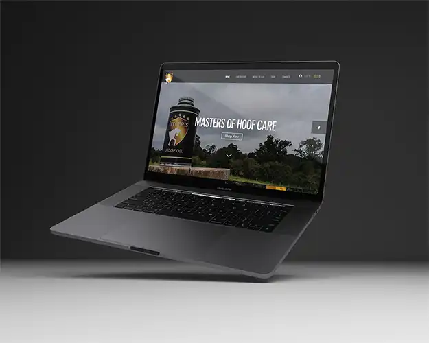 Laptop on a dark grey background displaying a website homepage for a hoof care product, featuring an image of a hoof oil container with a pasture scene in the background, styled in dark tones with easy navigation options.