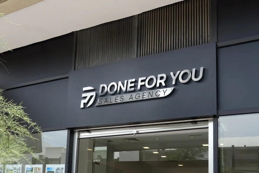 Exterior signage for a sales business featuring a modern 3D logo and text design, created by a Birmingham logo designer, highlighting a sleek and professional brand identity.