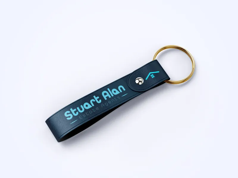 Keychain branded with the Birmingham real estate logo design, showcasing versatility.