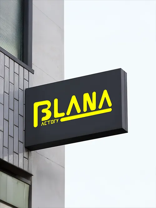 Modern black and yellow shopfront sign for a logo design Birmingham business, featuring bold typography with the text 'Blana Factory' and a sleek, minimalist design.