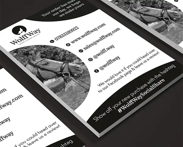 UK based WolfWay promotional leaflet featuring horse photo, contact details, and #WolfWaySocialShare hashtag for customer engagement