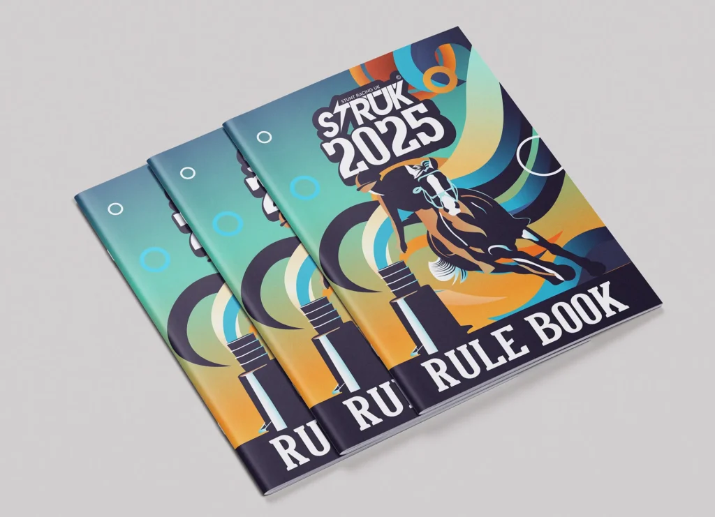 Stack of illustrated rule books with a bold, dynamic cover design featuring a galloping horse and vibrant abstract shapes in orange, teal, and navy tones.