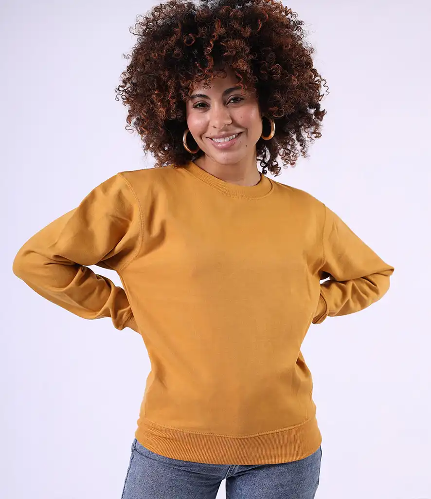 Woman wearing a plain mustard yellow sweatshirt, perfect for custom logo printing or embroidery great for merch, teamwear, or casual branding.
